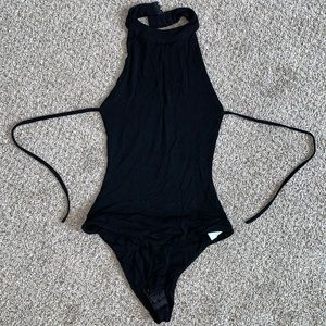 Black backless body suit